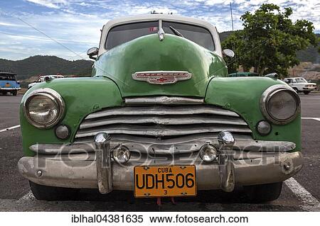 Chevrolet, green, vintage cars from the 40s, in Santiago de Cuba, Santiago de Cuba Province, Cuba, Central America View Large Photo Image Stock Photography - Chevrolet, green, vintage cars from the 40s, in Santiago de Cuba, Santiago de Cuba Province, Cuba, Central America. Fotosearch