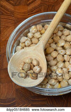 Chickpeas ( Cicer arietinum) in wooden ladle, soaked View Large Photo Image Stock Photography - Chickpeas ( Cicer arietinum) in wooden ladle, soaked. Fotosearch