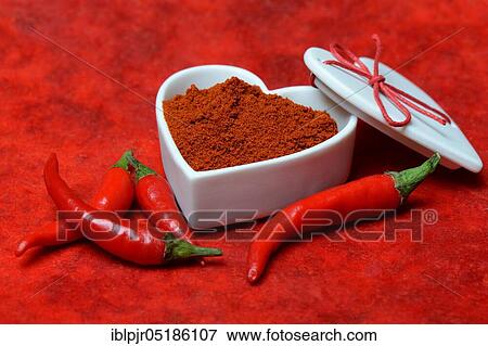 Chili powder in bowl with heart shape, chili peppers( Capsicum annuum), I love chili View Large Photo Image Stock Photo - Chili powder in bowl with heart shape, chili peppers( Capsicum annuum), I love chili. Fotosearch