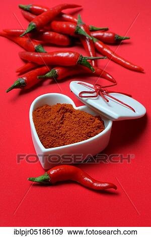 Chili powder in bowl with heart shape, chili peppers( Capsicum annuum), I love chili View Large Photo Image Stock Photo - Chili powder in bowl with heart shape, chili peppers( Capsicum annuum), I love chili. Fotosearch
