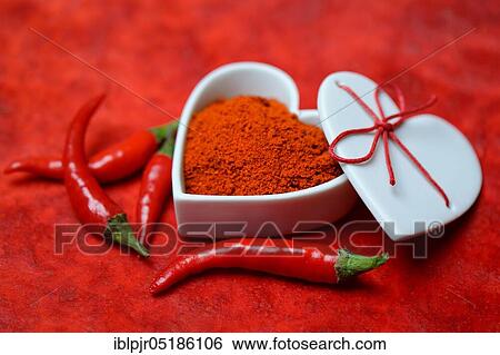 Chili powder in bowl with heart shape, chili peppers( Capsicum annuum), I love chili View Large Photo Image Stock Photograph - Chili powder in bowl with heart shape, chili peppers( Capsicum annuum), I love chili. Fotosearch