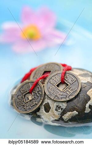 Chinese lucky coins, on stone View Large Photo Image Stock Photo - Chinese lucky coins, on stone. Fotosearch
