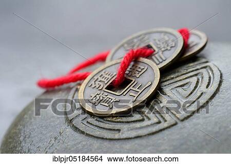 Chinese lucky coins on stone with seal, Feng Shui View Large Photo Image Picture - Chinese lucky coins on stone with seal, Feng Shui. Fotosearch
