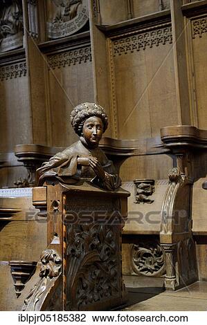 Stock Image - Church pews in the choir of Ulm Cathedral, Choir Stalls, Hellespontische Sybille, Ulm, Baden-Württemberg, Germany, Europe. Fotosearch