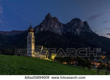 Church San Valentino at the blue hour in front of the Schlern, Castelrotto, South Tyrol, Italy, Europe View Large Photo Image Stock Photo - Church San Valentino at the blue hour in front of the Schlern, Castelrotto, South Tyrol, Italy, Europe. Fotosearch