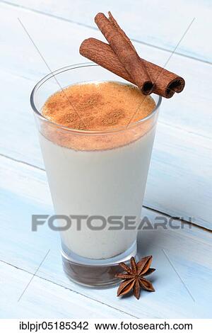 Cinnamon milk in glass with cinnamon sticks and star anise View Large Photo Image Stock Image - Cinnamon milk in glass with cinnamon sticks and star anise. Fotosearch