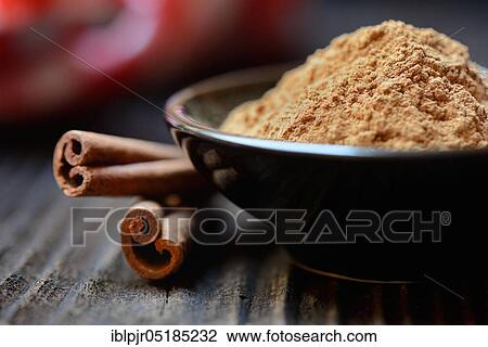 Cinnamonpowder ( Cinnamomum) in bowl and bars spec View Large Photo Image Stock Image - Cinnamonpowder ( Cinnamomum) in bowl and bars spec. Fotosearch