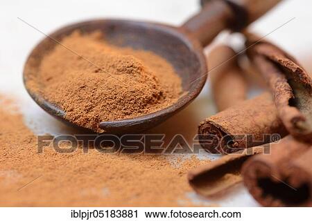 Cinnamonpowder (Cinnamomum spec. ) in wooden spoons and sticks View Large Photo Image Stock Image - Cinnamonpowder (Cinnamomum spec. ) in wooden spoons and sticks. Fotosearch