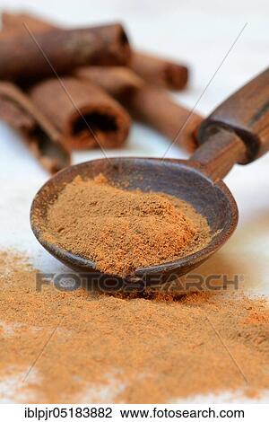 Cinnamonpowder (Cinnamomum spec. ) in wooden spoons and sticks View Large Photo Image Stock Image - Cinnamonpowder (Cinnamomum spec. ) in wooden spoons and sticks. Fotosearch