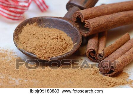 Cinnamonpowder (Cinnamomum spec. ) in wooden spoons and sticks View Large Photo Image Stock Image - Cinnamonpowder (Cinnamomum spec. ) in wooden spoons and sticks. Fotosearch