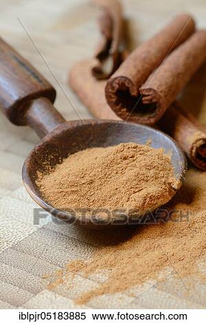 Cinnamonpowder (Cinnamomum spec. ) in wooden spoons and sticks View Large Photo Image Stock Photography - Cinnamonpowder (Cinnamomum spec. ) in wooden spoons and sticks. Fotosearch