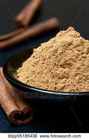 Cinnamonpowders and rods View Large Photo Image Stock Photo - Cinnamonpowders and rods. Fotosearch