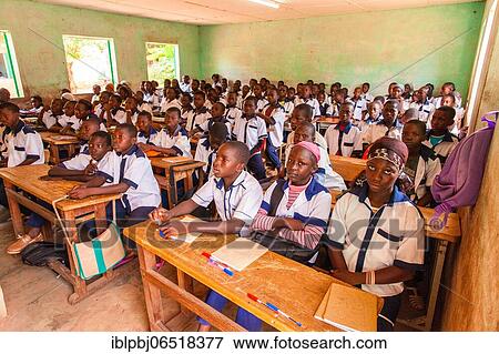 Stock Photo - Classroom with students in school uniform, Bobo-Dioulasso, Burkina Faso, Africa. Fotosearch