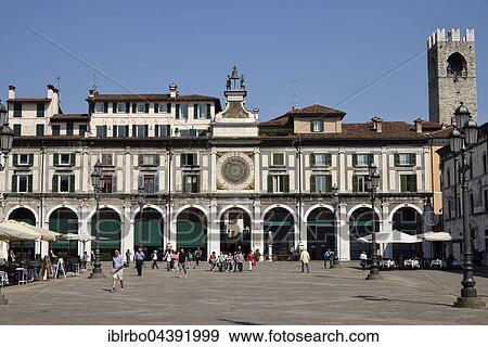 Stock Photo - Clock tower with historical astronomical clock, Piazza della Loggia, Province of Brescia, Lombardy, Italy, Europe. Fotosearch