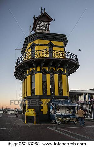 Clock Tower, yellow clock tower (Victoria) and Alfred Waterfront, Cape Town, Western Cape, Republic of South Africa View Large Photo Image Stock Photo - Clock Tower, yellow clock tower (Victoria) and Alfred Waterfront, Cape Town, Western Cape, Republic of South Africa. Fotosearch