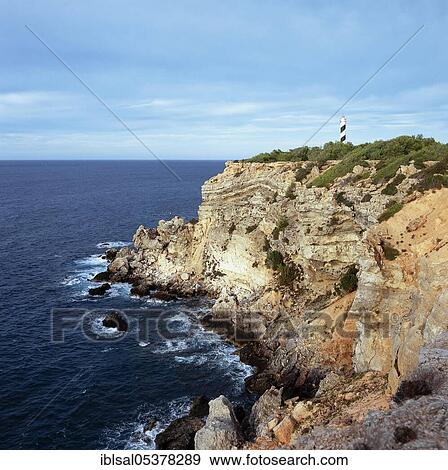 Coast of Portinatx, Lighthouse, Balearic Islands, Ibiza, Spain, Europe View Large Photo Image Stock Photo - Coast of Portinatx, Lighthouse, Balearic Islands, Ibiza, Spain, Europe. Fotosearch