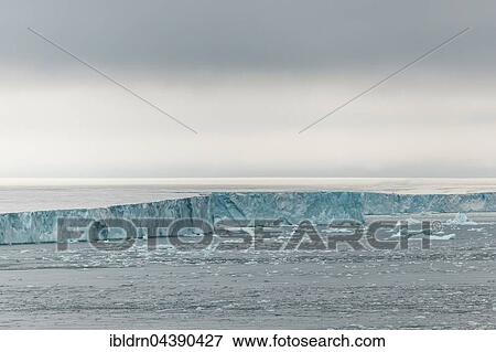 Coastline at the Austfonna glacier, Nordaustlandet, Svalbard, Spitsbergen, Norway, Europe View Large Photo Image Stock Photo - Coastline at the Austfonna glacier, Nordaustlandet, Svalbard, Spitsbergen, Norway, Europe. Fotosearch