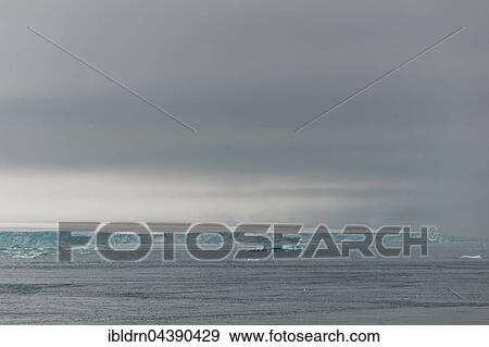 Stock Photo - Coastline at the Austfonna glacier, Nordaustlandet, Svalbard, Spitsbergen, Norway, Europe. Fotosearch