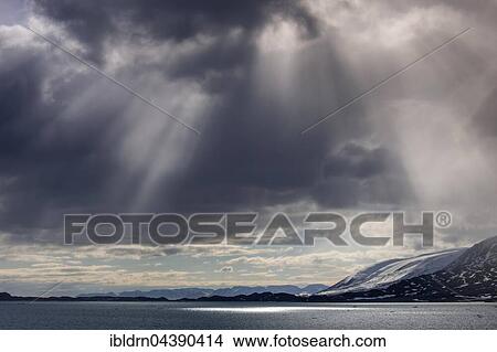 Coastline, rays of sunlight, Svalbard, Spitsbergen, Norway, Europe View Large Photo Image Picture - Coastline, rays of sunlight, Svalbard, Spitsbergen, Norway, Europe. Fotosearch