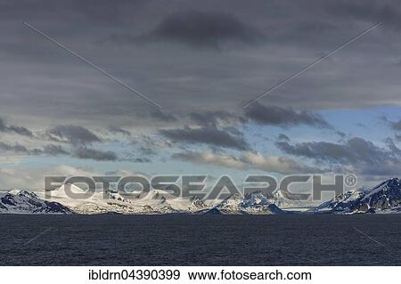 Coastline, snowy mountains, Northwest Coast, Svalbard, Spitsbergen, Norway, Europe View Large Photo Image Stock Photo - Coastline, snowy mountains, Northwest Coast, Svalbard, Spitsbergen, Norway, Europe. Fotosearch