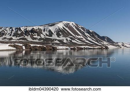 Coastline, snowy mountains, Woodfjorden, Svalbard, Spitsbergen, Norway, Europe View Large Photo Image Stock Image - Coastline, snowy mountains, Woodfjorden, Svalbard, Spitsbergen, Norway, Europe. Fotosearch