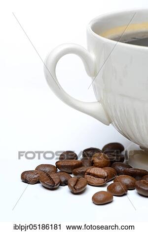 Coffee beans and cup ( Coffea arabica) View Large Photo Image Stock Image - Coffee beans and cup ( Coffea arabica). Fotosearch