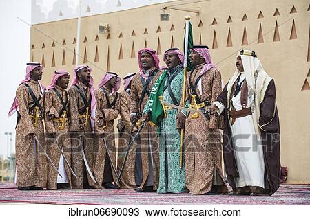 Stock Image - Colourful dressed traditional men, Al Janadriyah Festival, Riadh, Saudi Arabia, Asia. Fotosearch