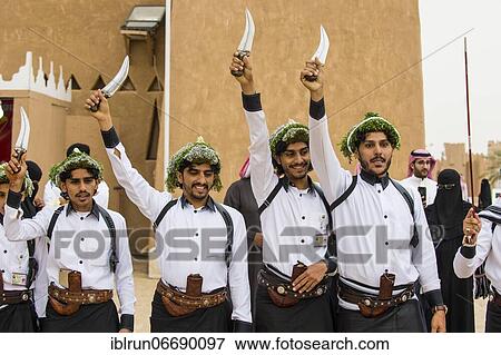 Stock Photo - Colourful dressed traditional men, Al Janadriyah Festival, Riadh, Saudi Arabia, Asia. Fotosearch