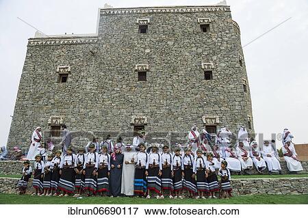 Stock Photo - Colourful dressed traditional men, Al Janadriyah Festival, Riadh, Saudi Arabia, Asia. Fotosearch