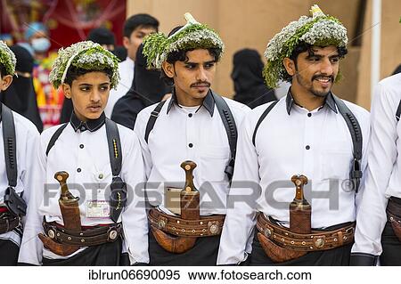 Stock Photography - Colourful dressed traditional men, Al Janadriyah Festival, Riadh, Saudi Arabia, Asia. Fotosearch