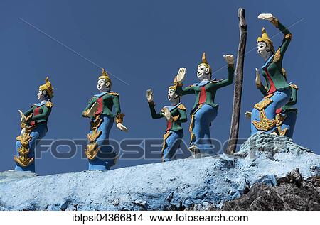 Picture - Colourful statues at Bayin Nyi, cave temple and hot springs, Mon State, Myanmar, Asia. Fotosearch