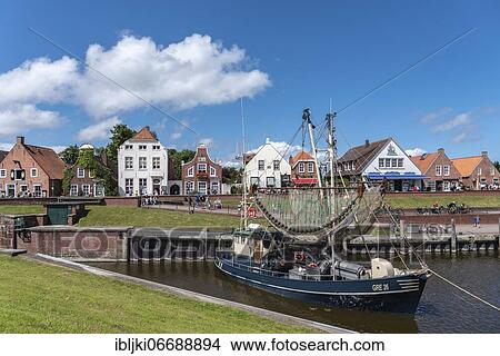 Crab cutter in the fishing harbour, Greetsiel, Lower Saxony, Germany, Europe View Large Photo Image Picture - Crab cutter in the fishing harbour, Greetsiel, Lower Saxony, Germany, Europe. Fotosearch