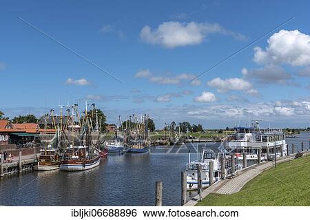Stock Photograph - Crab cutter in the fishing harbour, Greetsiel, Lower Saxony, Germany, Europe. Fotosearch