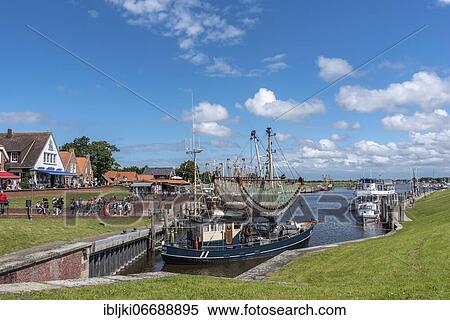 Crab cutter in the fishing harbour, Greetsiel, Lower Saxony, Germany, Europe View Large Photo Image Stock Photography - Crab cutter in the fishing harbour, Greetsiel, Lower Saxony, Germany, Europe. Fotosearch