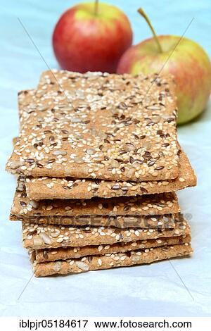 Stock Photo - Crispbread with seeds, flaxseed, sesame seed, sunflower seeds. Fotosearch