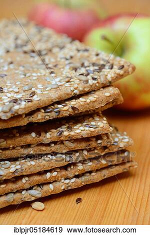 Stock Photo - Crispbread with seeds, flaxseed, sesame seed, sunflower seeds. Fotosearch