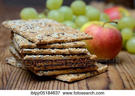Stock Photo - Crispbread with seeds, flaxseed, sesame seed, sunflower seeds. Fotosearch