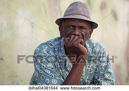 Cuban man wearing a hat, portrait, Cuba, Central America View Large Photo Image Picture - Cuban man wearing a hat, portrait, Cuba, Central America. Fotosearch