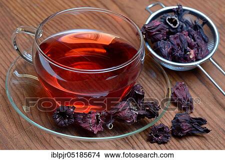 Picture - Cup mallow tea ( Hibiscus sabdariffa) and dried flowers, hibiscus tea. Fotosearch