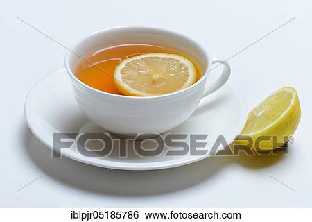 Stock Photograph - Cup of black tea with lemon. Fotosearch