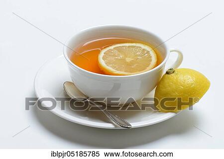 Stock Photography - Cup of black tea with lemon. Fotosearch