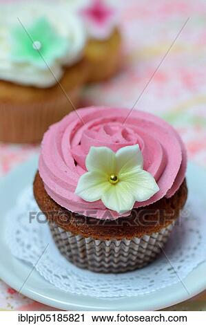 Stock Image - Cupcake on plate. Fotosearch
