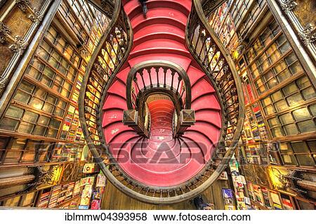 Stock Photo - Curved wooden staircase in library, Livraria Lello & Irmão bookstore, Porto, Portugal, Europe. Fotosearch