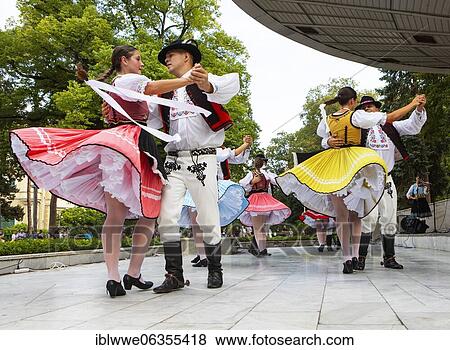 Stock Photo - Dance performance of a folklore group in Mestsky Park, spa, Piestany, Slovakia, Europe. Fotosearch