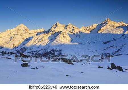 Dent Blanche, 4357 m, Ober Gabelhorn, 4063m, Zinalrothorn, 4221m, Valais, Switzerland, Europe View Large Photo Image Stock Photo - Dent Blanche, 4357 m, Ober Gabelhorn, 4063m, Zinalrothorn, 4221m, Valais, Switzerland, Europe. Fotosearch