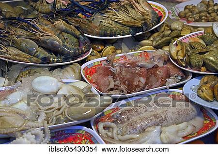 Picture - Different kinds of seafood, Naka Weekend Market, Phuket, Thailand, Asia. Fotosearch