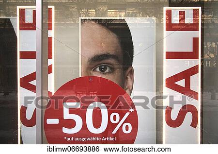 Stock Photograph - Discount battle in shop windows, SALE, price reductions, Corona crisis, Stuttgart, Baden-Württemberg, Germany, Europe. Fotosearch