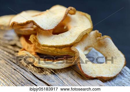 Dried apple slices, dried apple View Large Photo Image Stock Photo - Dried apple slices, dried apple. Fotosearch