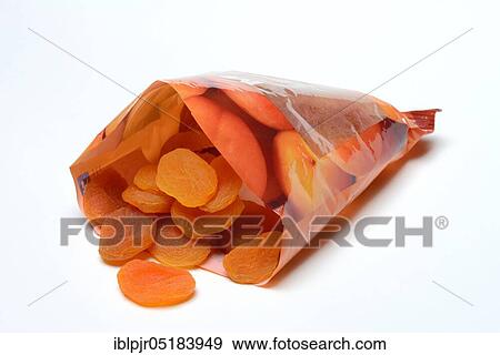 Stock Photo - Dried Apricots (Prunus armeniaca) in packing. Fotosearch