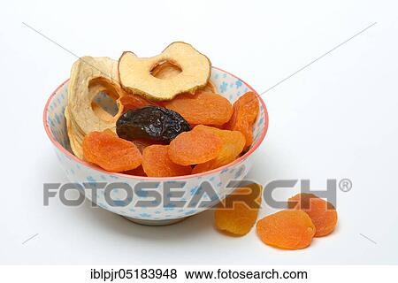 Dried fruit, apple, apple rings, apple slices, apricot, apricots, plum, plums View Large Photo Image Stock Photo - Dried fruit, apple, apple rings, apple slices, apricot, apricots, plum, plums. Fotosearch